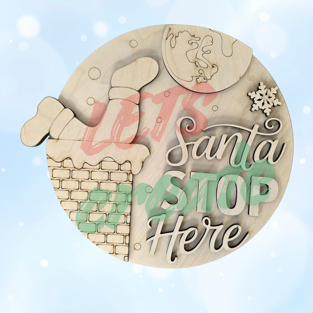 A layered wooden Christmas sign featuring Santa's legs sticking out of a chimney against a background with a snowflake and the moon, displaying the script words "Santa Stop Here" on a white wood plank background.